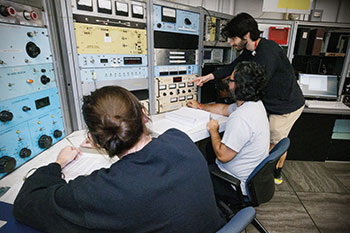 Photo of students working. Links to Gifts of Life Insurance